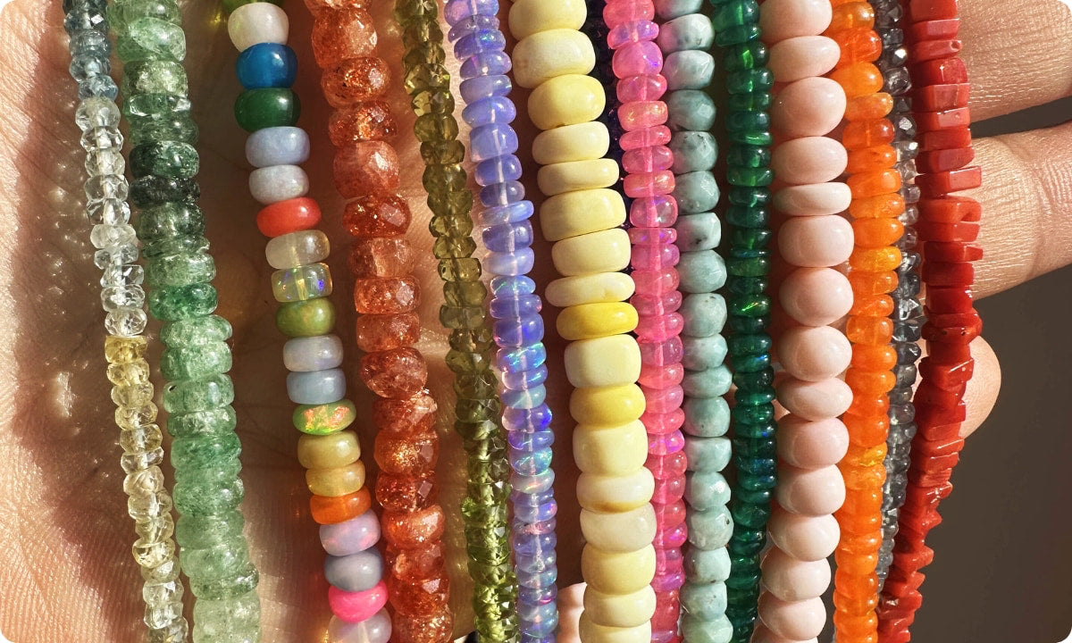 Close-up of colorful beaded bracelets held together.