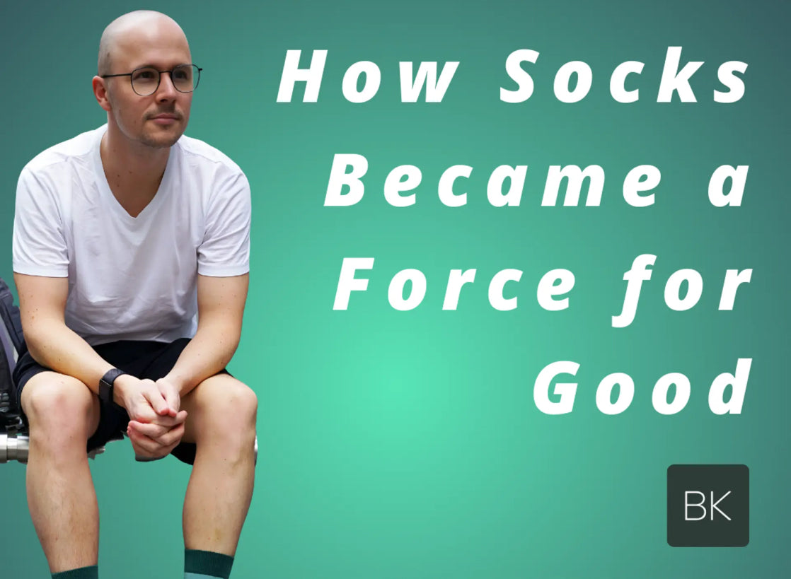 Andy sitting with text 'How Socks Became a Force for Good' on a green background
