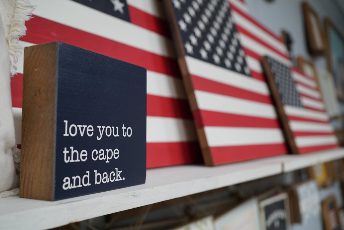 Coastal wooden signs on display at Rustic Marlin
