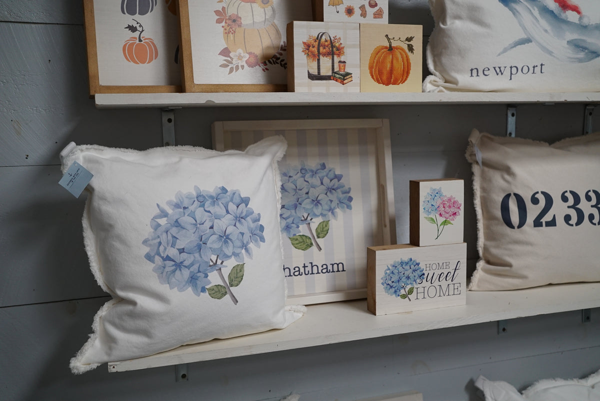 Hydrangea cushions and seasonal home decor in the Rustic Marlin showroom