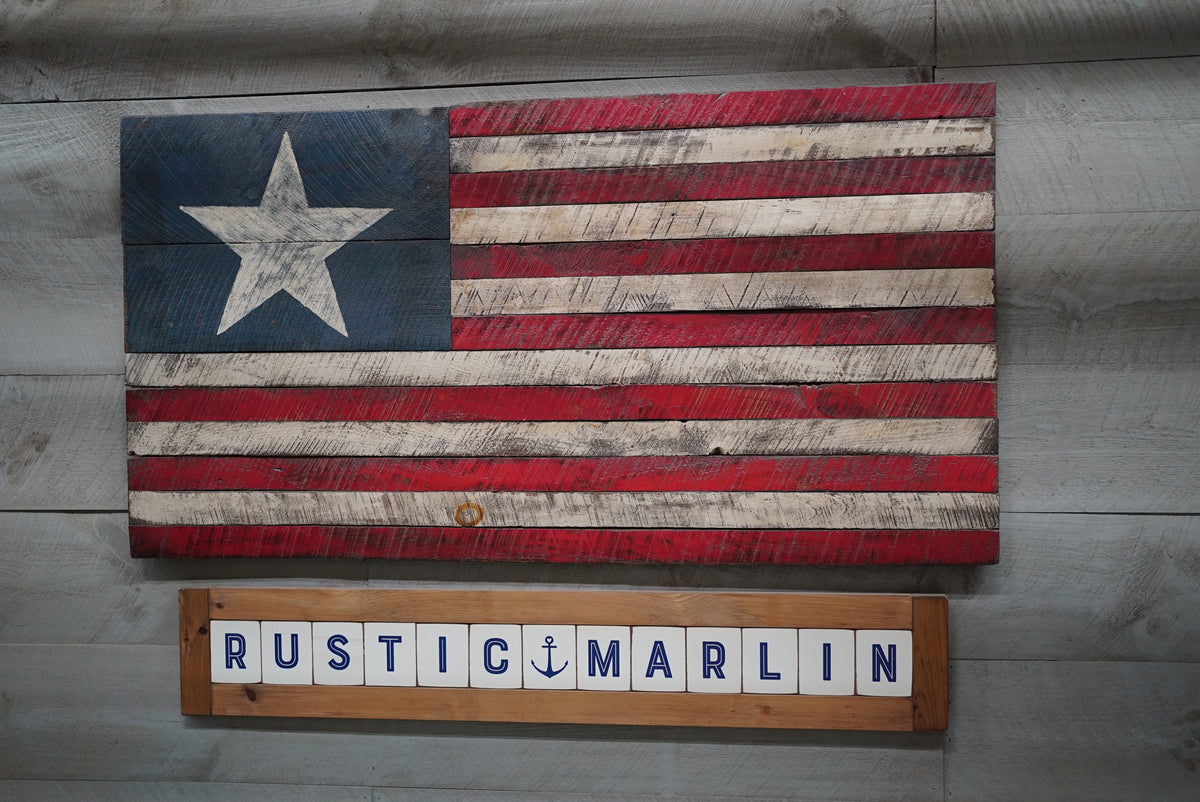 Handcrafted wooden flag and Rustic Marlin sign