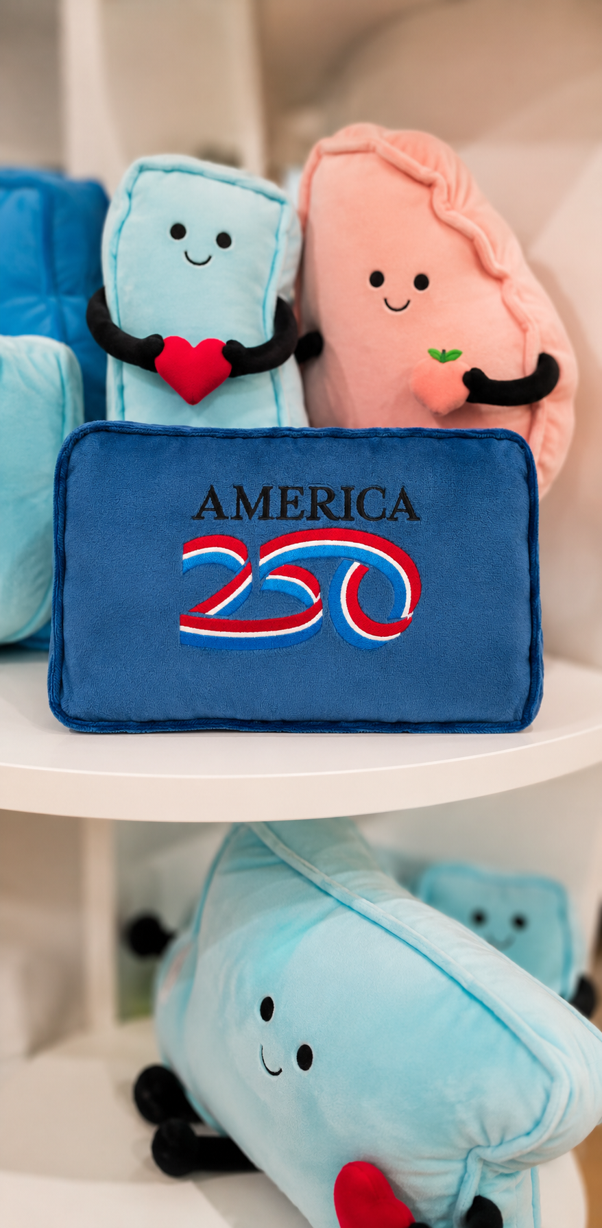 Stuffed States plush and the America 250 collection on shelves